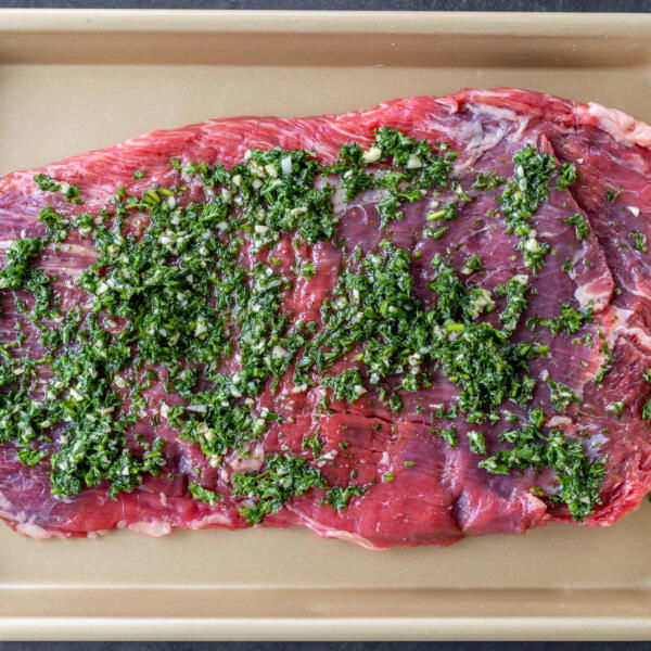 Flank on a sheet pan with Chimichurri.