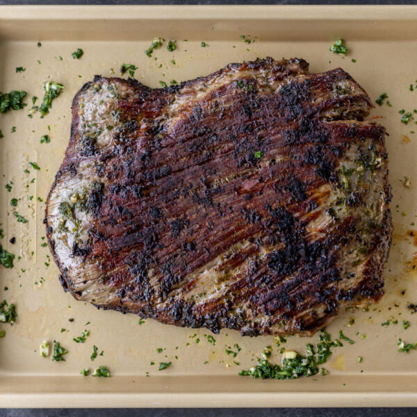 Cooked Chimichurri Steak on a baking sheet.