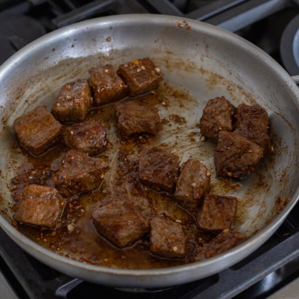 Steak tossed with garlic butter.