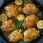 Herb Roasted Chicken Thighs in a baking pan.