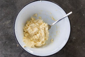 Syrniki dough in a bowl.