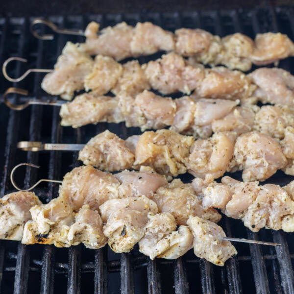 Garlic Parmesan Chicken skewers grilling.
