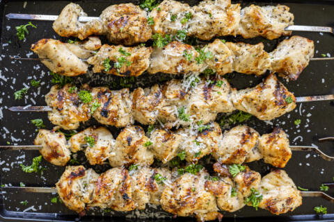 Garlic Parmesan Chicken Skewers with herbs and parmesan.