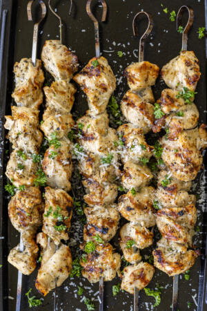 Garlic Parmesan Chicken Skewers with herbs and parmesan.