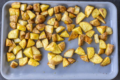 Roasted potatoes on a baking sheet.