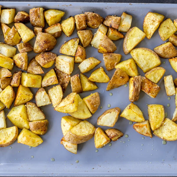 Roasted potatoes on a baking sheet.