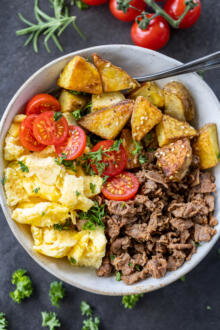 Make-Ahead Breakfast Bowls with veggies and herbs.