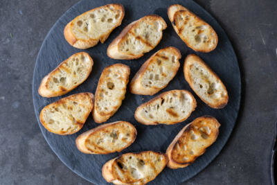 Toasted bread on a tray.