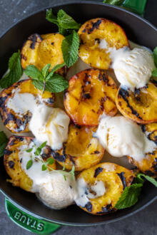 Serving tray with Grilled Peaches with Ice Cream .