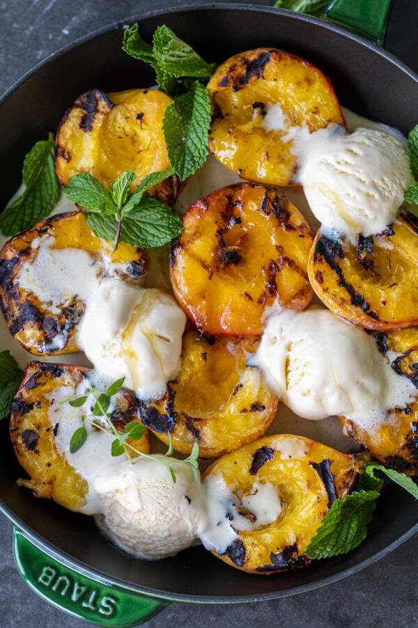 Serving tray with Grilled Peaches with Ice Cream .