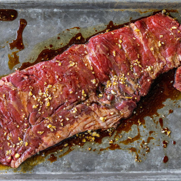 Skirt steak with marinade.