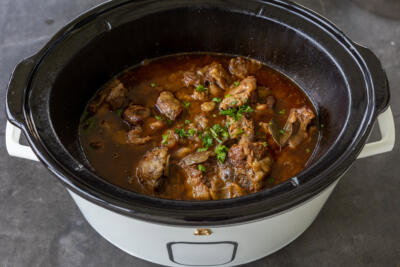 Slow Cooker Oxtails in a slow cooker.