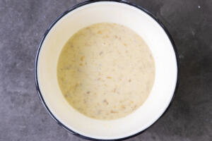 All the wet ingredients for muffin recipe in a bowl.