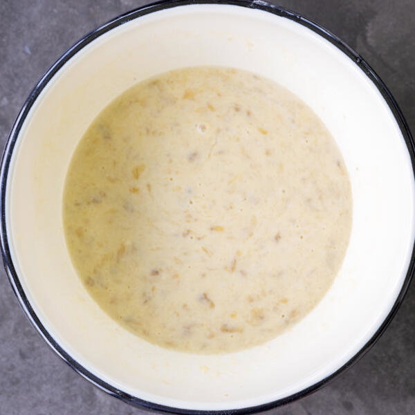 All the wet ingredients for muffin recipe in a bowl.