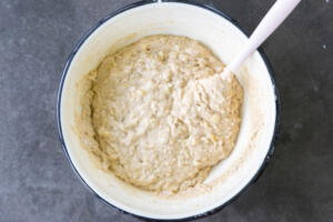Blueberry muffin batter in a bowl.