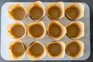 Muffin pan with liners.