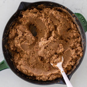 Warmed up tortillas in a pan.
