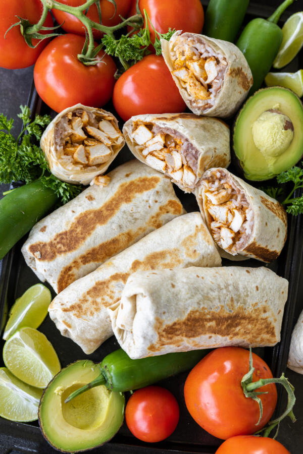 Chicken Burritos on a serving tray. 