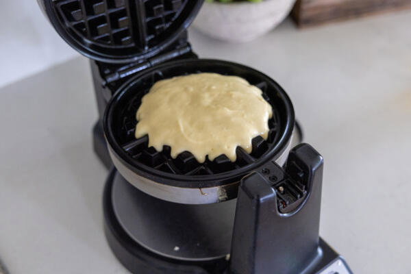 Cottage Cheese Waffle batter in a waffle maker.