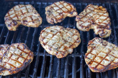 Pork Loin Chops on a grill.