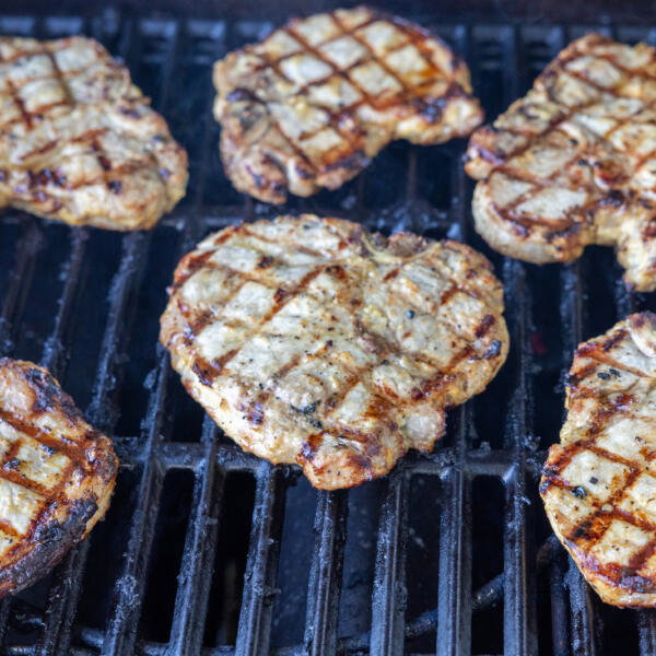 Pork Loin Chops on a grill.
