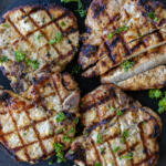 Pork Loin Chops sliced on a serving plate.