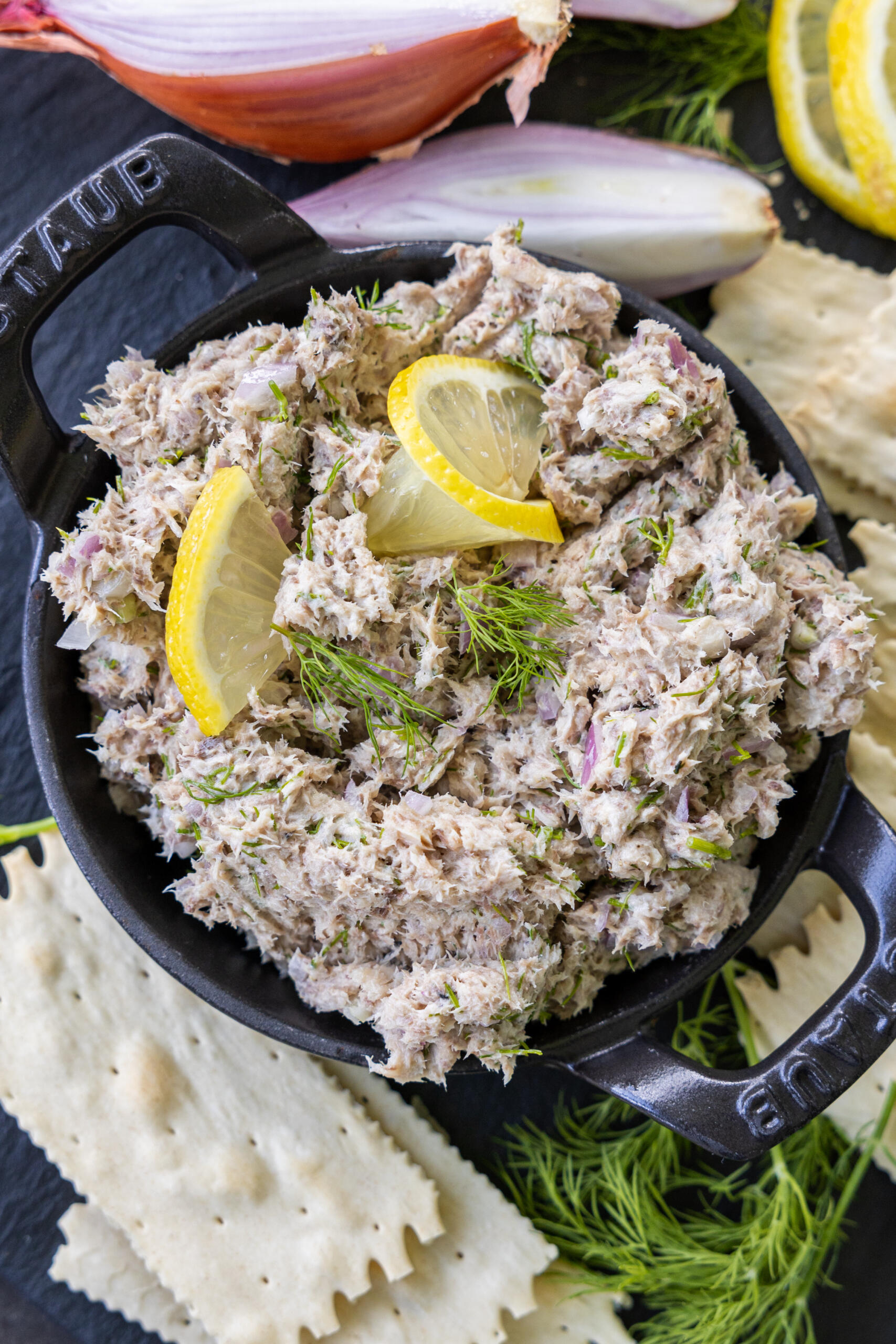 Sardine Rillettes in a serving dish with crackers.