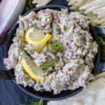 Sardine Rillettes in a serving dish with crackers.