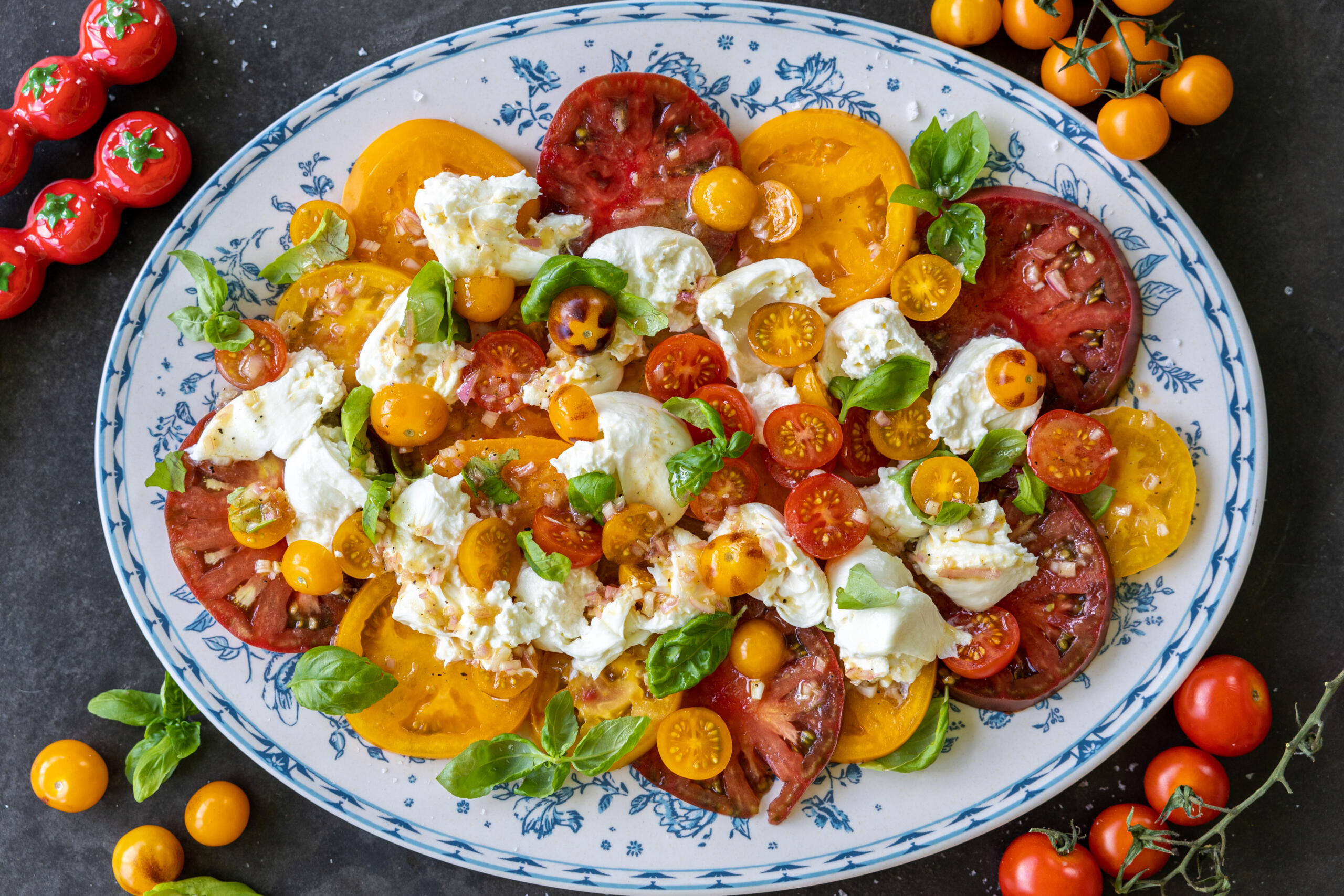 Tomato Burrata Salad on a serving plate.
