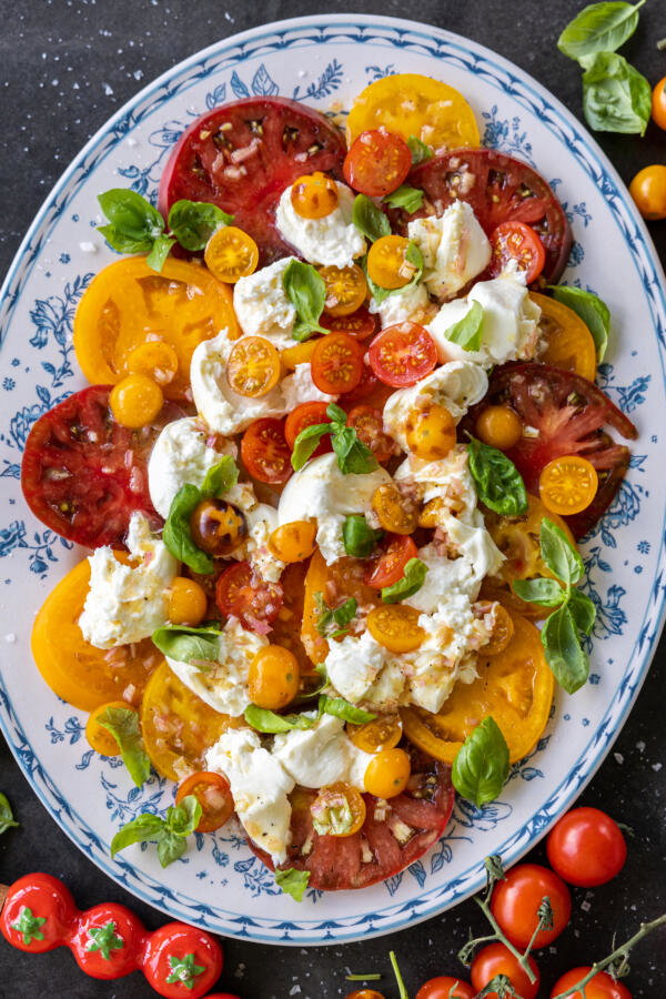 Plated Tomato Burrata Salad.