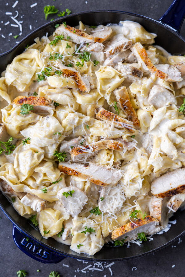 Chicken Alfredo Tortellini in a pan.