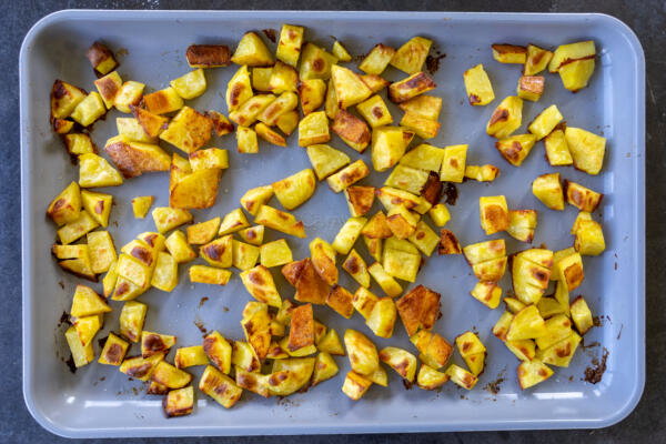 Potatoes on a sheet pan.