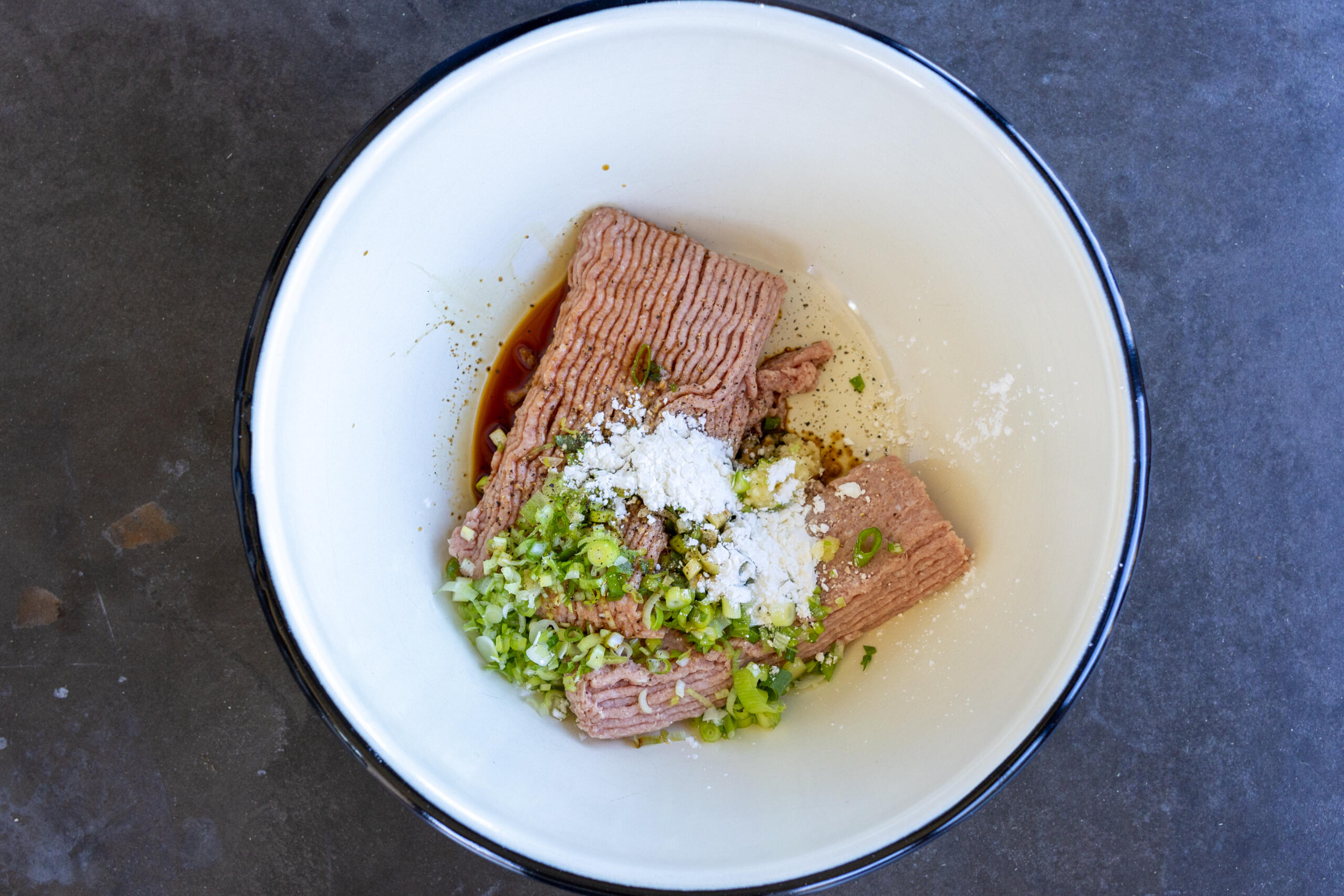 Meatball ingredients in a bowl.